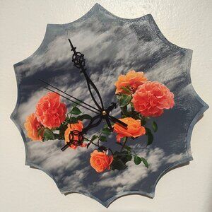 orange roses in the sky clock